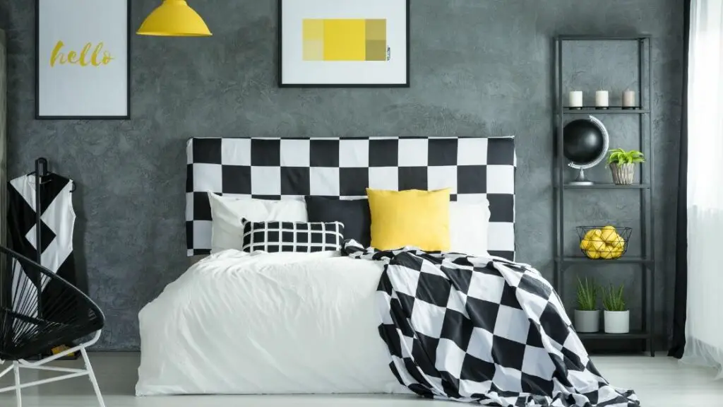 Black and White Bedroom With Pop Of Yellow
