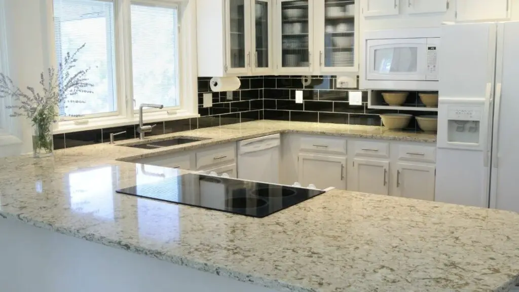 Black Tiled Kitchen Backsplash White Cabinets
