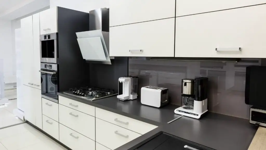 Black and Gray Kitchen Backsplash White Cabinets