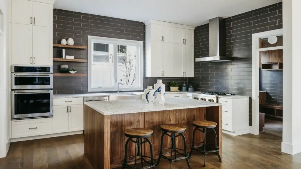 Dark Gray Tiled Kitchen Backsplash White Cabinets