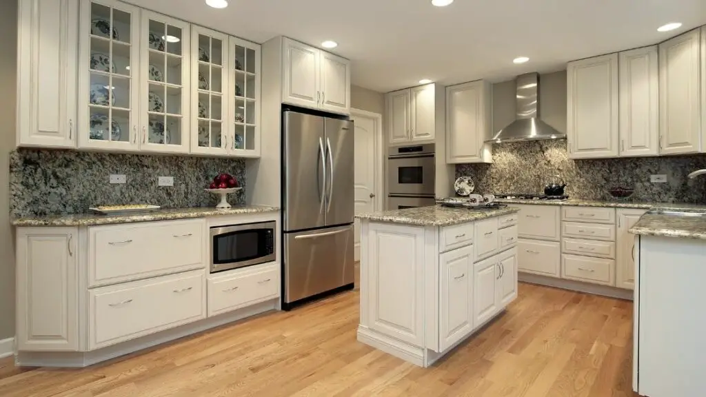 Gray Stone Kitchen Backsplash White Cabinets