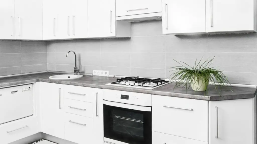Gray Tile Kitchen Backsplash White Cabinets