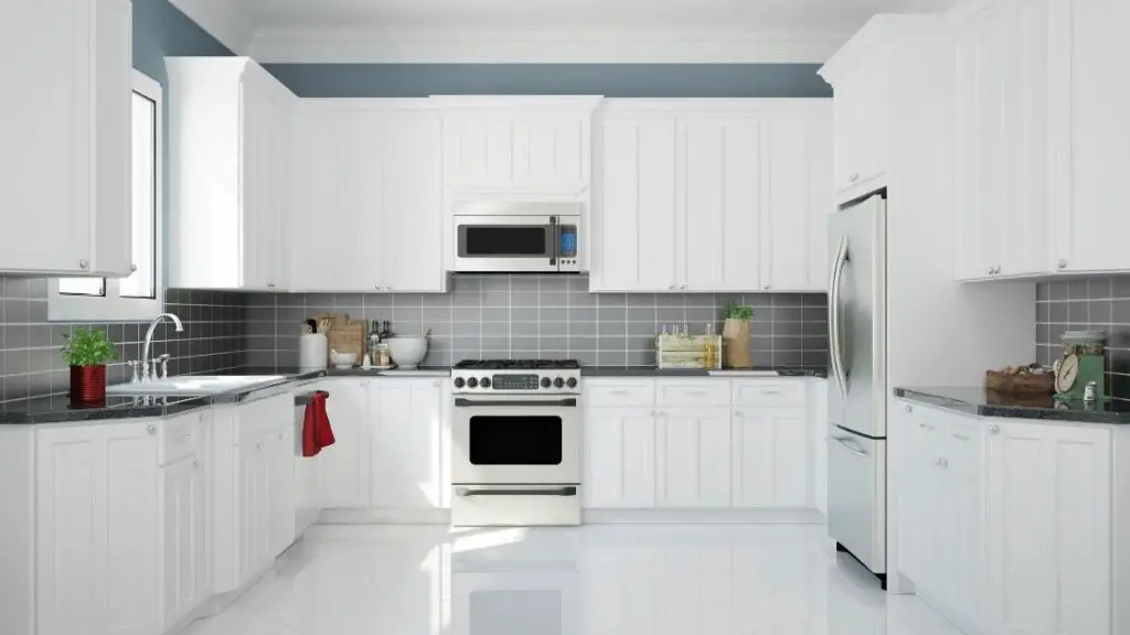Gray Tiled Kitchen Backsplash White Cabinets