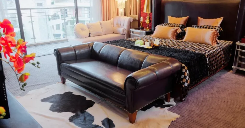 Leather sofa in mens bedroom