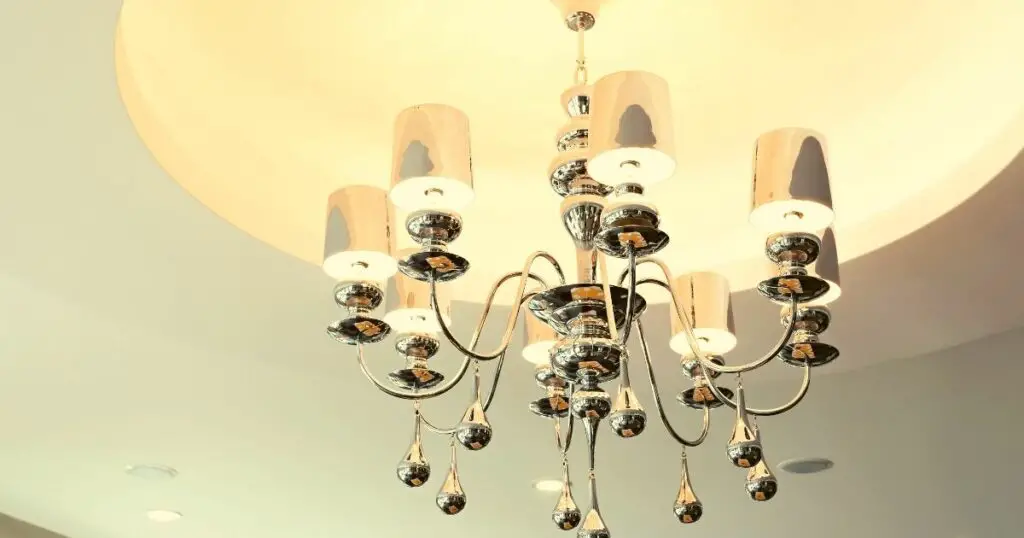 Hang a Chandelier or Other Light Fixture to Draw the Eye Upward
