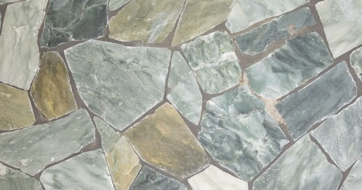 Transform your small shower into a luxurious retreat with stone tiles.