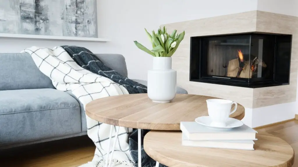 Create a warm and inviting space with a fireplace and console table
