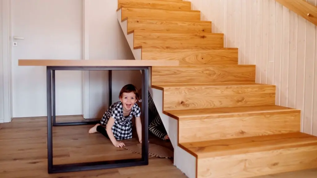 Transform your under stairs into a fun and colorful play area for the kids.