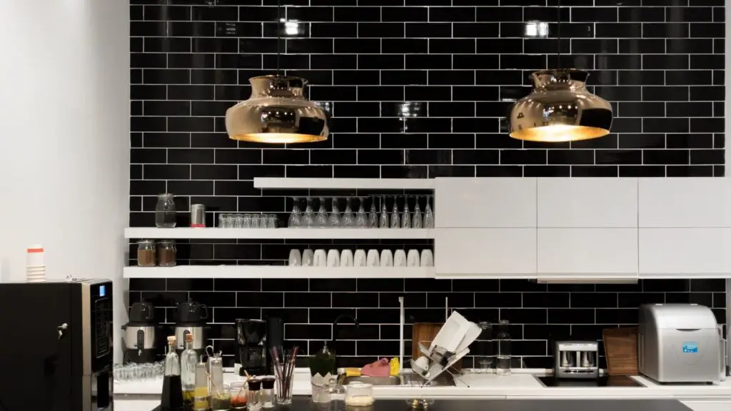 kitchen color schemes with black appliances
