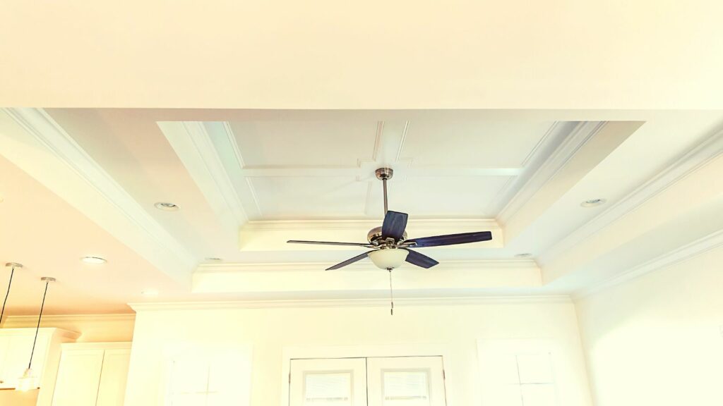 Add definition and interest to your living room tray ceiling with crown molding